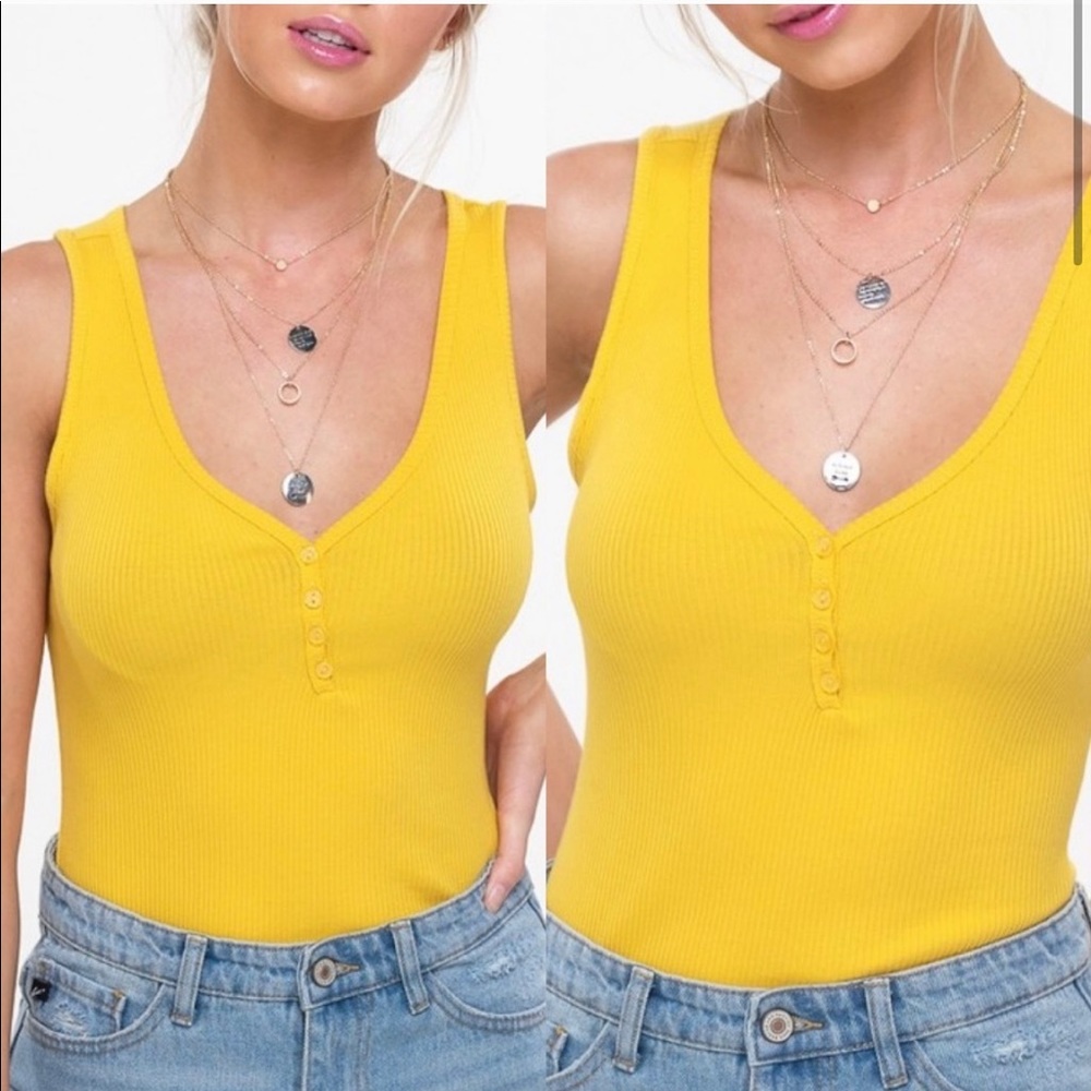 🦄 4/$40 Basic V Neck Yellow Bodysuit